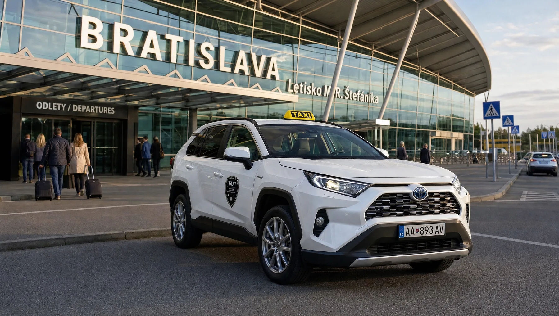 White Toyota RAV4 taxi in front of Bratislava airport